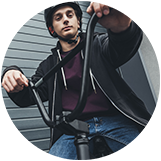 Guy on a BMX bike social media avatar